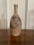 The potters hand has created this classic style vase with the graduation of colors ranging from blush tone at the top...