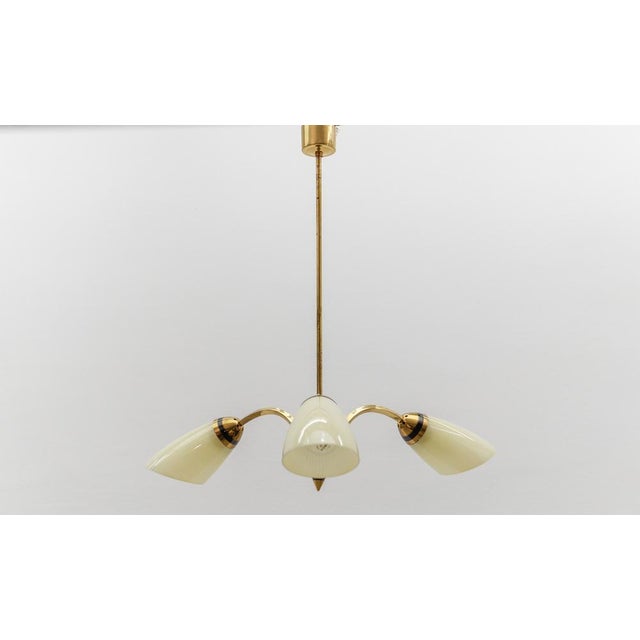 Lovely Mid-Century Modern 3-Armed Brass Sputnik Lamp, 1950s Rare and elegant Mid-Century ceiling lamp, 1950s. Executed in...