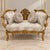 Add an elegant European statement to your interior with this luxurious French Louis XV-style settee, featuring an...