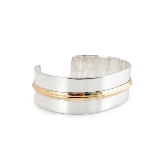 Brand: James Avery Gender: Ladies Metal Type: 14K Yellow Gold & 925 Silver Length: 6.50 inches Width: 19.00 mm Weight:...