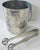 Arts & Crafts style in the tongs and hammered surfaces throughout, this stunning ice bucket looks great on any bar. Clean...