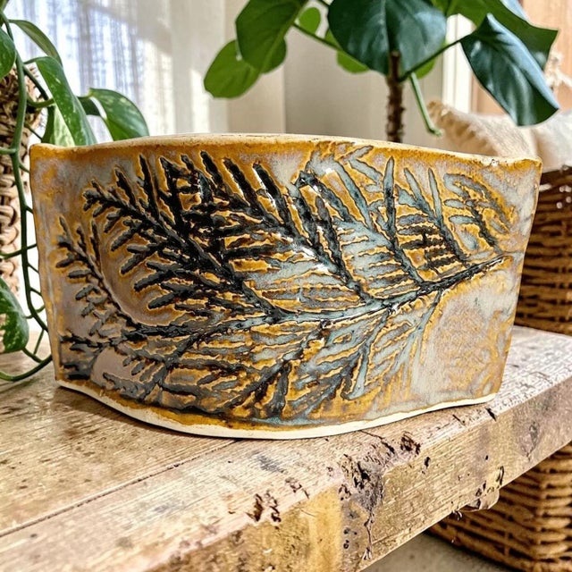 Elevate your home decor with this Artisan Made Embossed Cyprus Slab Pottery Vase, a stunning piece that showcases...