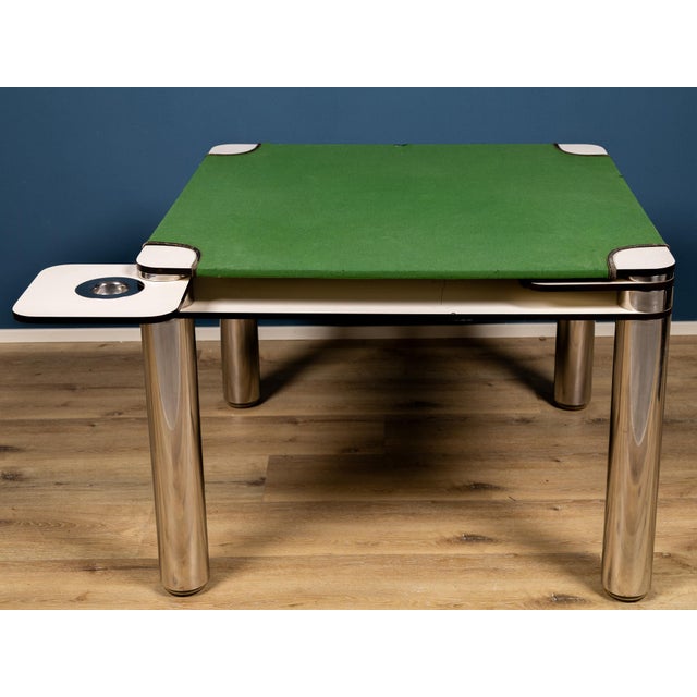 Iconic poker table designed by Joe Colombo for the Italian manufacturer Zanotta in 1968. The vibrant poker table features...