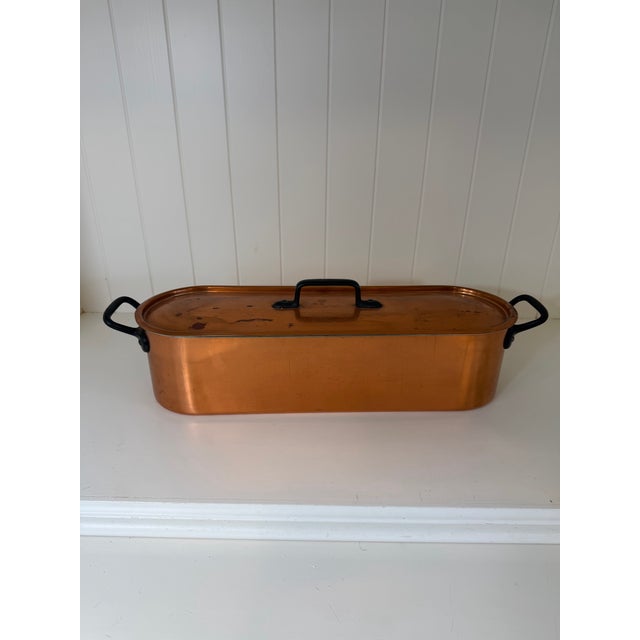 Vintage French Copper Fish Poacher with Original Insert and Lid, Circa 1950–1970 Bring timeless French style to your...