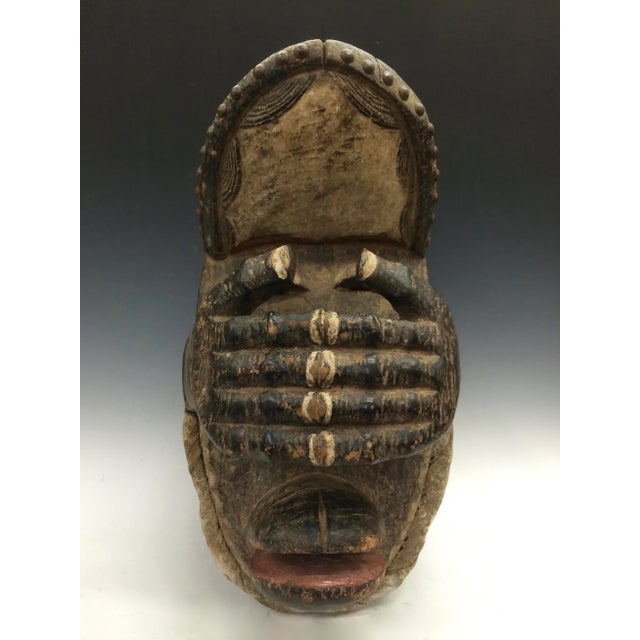 African art, Tribal art Large Bete Mask from Ivory Coast. A little wear due to aged. Excellent condition.