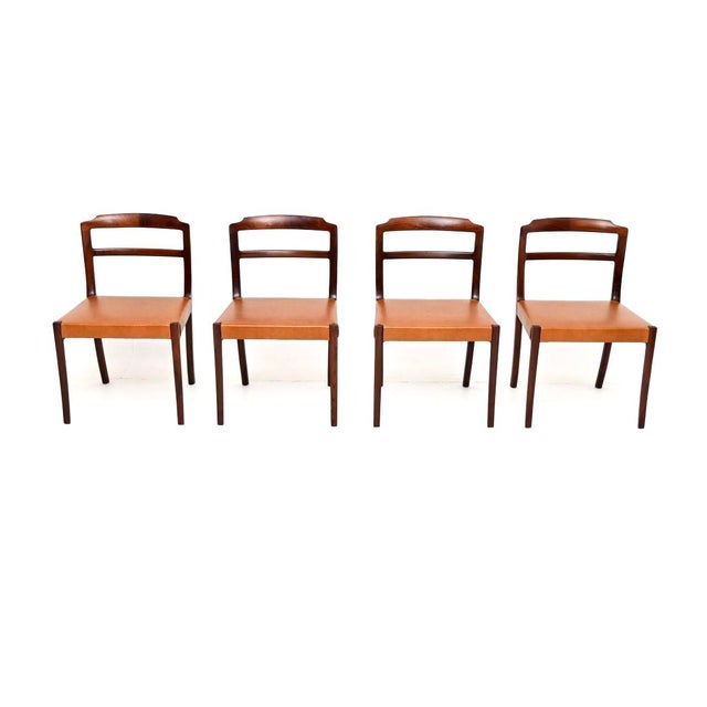 A stunning set of four vintage Danish dining chairs by Ole Wanscher. They were recently imported from Denmark, they date...
