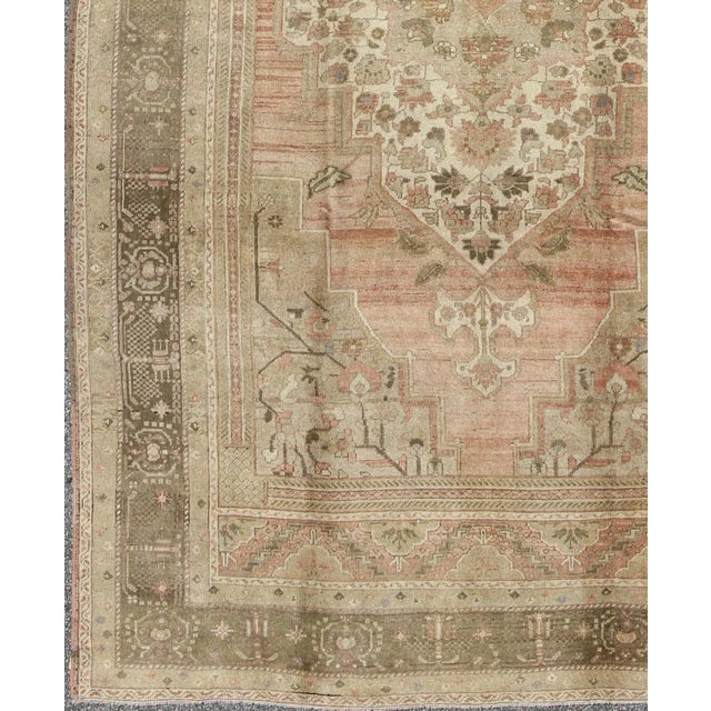 Turkish Vintage Turkish Oushak Rug With Faint Salmon Field and Floral Motifs For Sale - Image 3 of 10