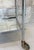 A fabulous drinks trolley made from chrome and mirrored glass with a bottle holder dating from the middle of last century....