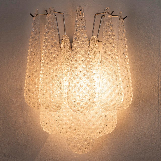 Wall sconce with murano glass decorated crystal color made in italy, elegant wall lamp with spoon-shaped glass. type: made...