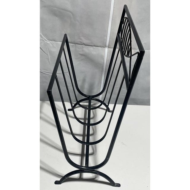 MCM Black Fish Magazine Record Holder, Log Raack. This black wire magazine rack features a distinctive fish motif design...