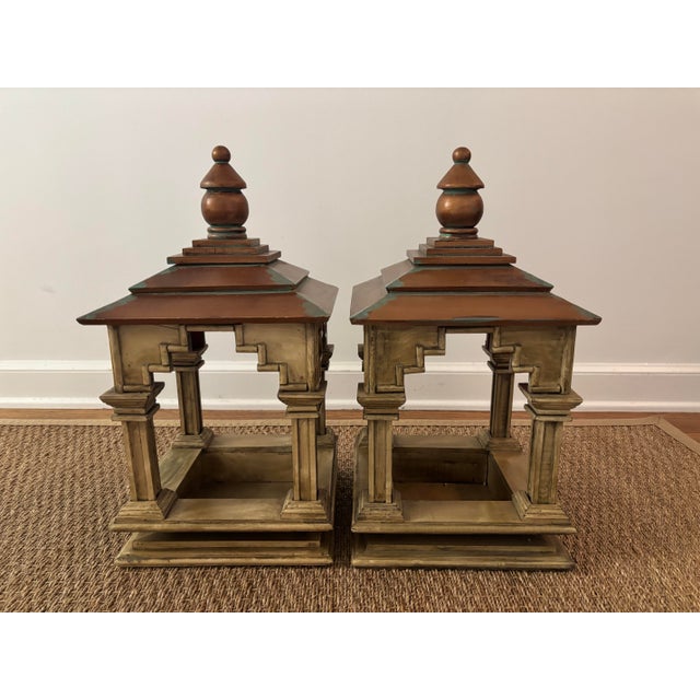 The absolute most charming pair of vintage pagoda-style lantern stands in solid wood with a beautiful distressed finish....