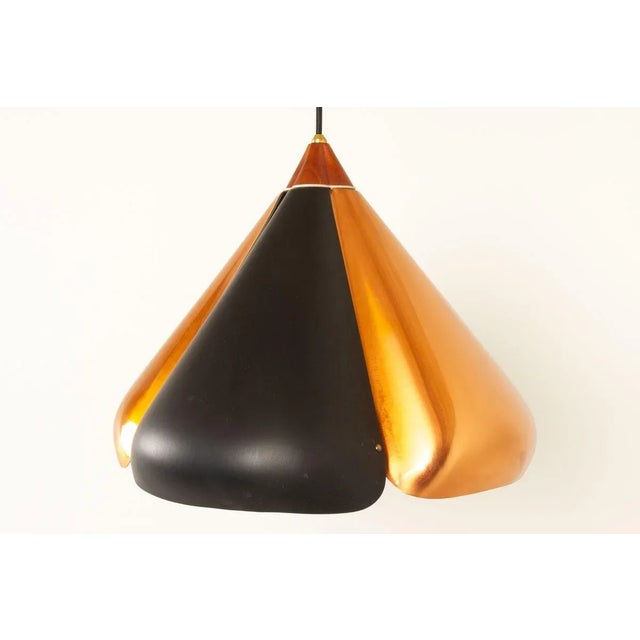 Mid-century Danish Copper and Black Pendant 1960s Vintage ceiling pendant lamp shaped as a four-leaf clover. Four shades...
