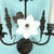 Metal Vintage 7 Light Wrought Iron Wall Sconce With Milk Glass Flowers & Cherub Motif Matching Sconce Available Separately For Sale - Image 7 of 12