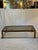 Glamorous three-piece Italian Modern set in the style of Romeo Rega and Willy Rizzo. All-metal construction with a...