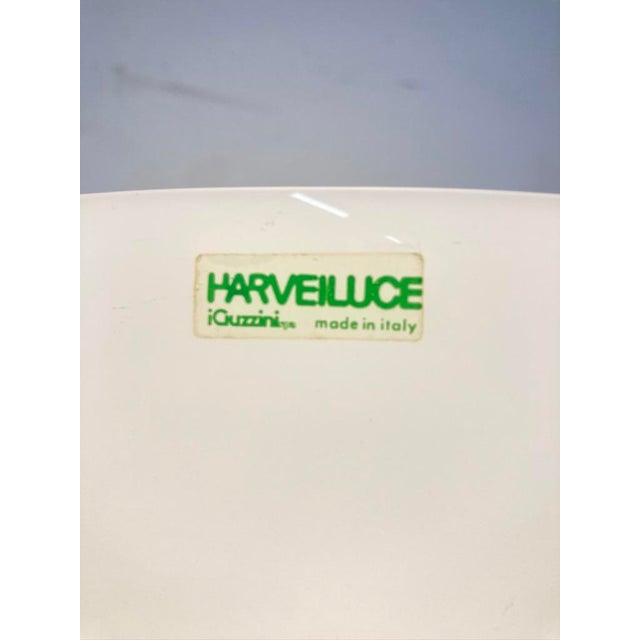 One 1970s floor lamp, single-bulb, E27 socket, by Harveiluce (Guzzini). Chrome-plated metal, white plastic. Good used...