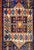 A wonderfully "tribal" 19th century Kazak rug with boldly woven floral, vegetable and animal motifs woven in crimson,...