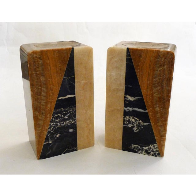 Pair of Art Deco bookends; formerly part of a mantelpiece (framing a clock), rectangular blocks, polychrome graphic...