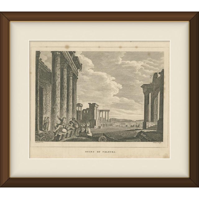 This antique engraving of the ruins of Palmyra in Syria, showing the great colonnaded avenue of the ancient city, is an...