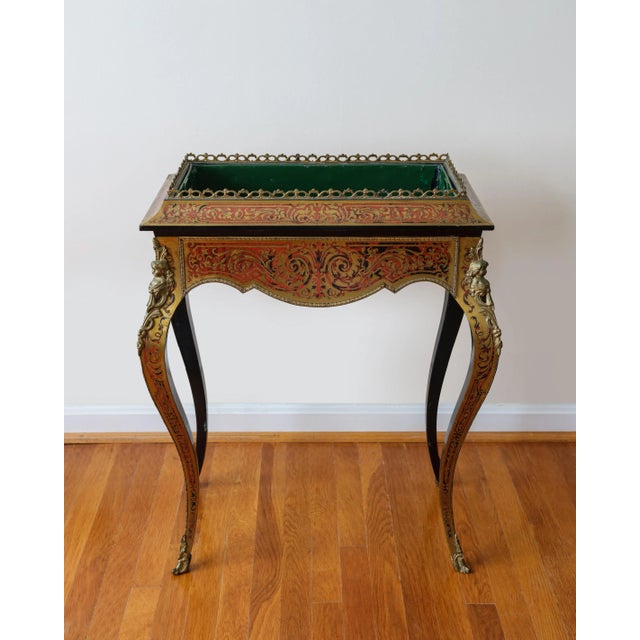 19th-century planter in the André-Charles Boulle style highly prized during the Napoleon III period. This exquisite piece...