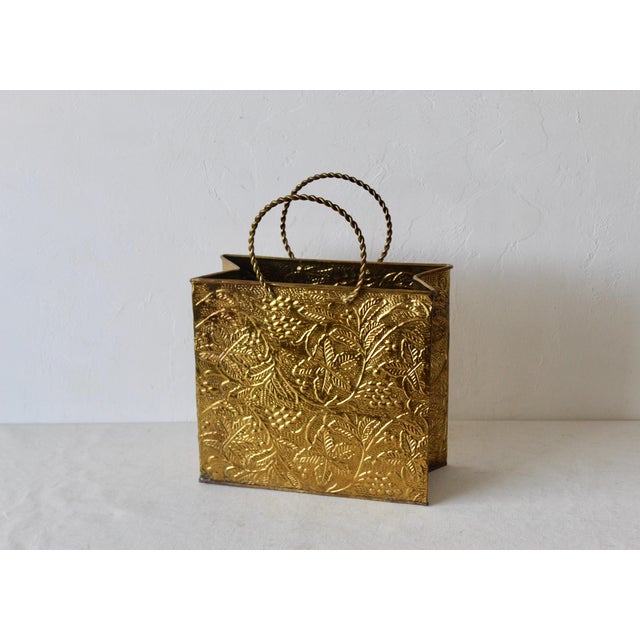 Sarreid Ltd Style Embossed Solid Brass Shopping Tote Bag Magazine Holder. In vintage condition with a small dent in one...