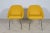 A pair of armchairs made in Great Britain in the 1960s. The armchairs have undergone upholstery renovation. Upholstery...