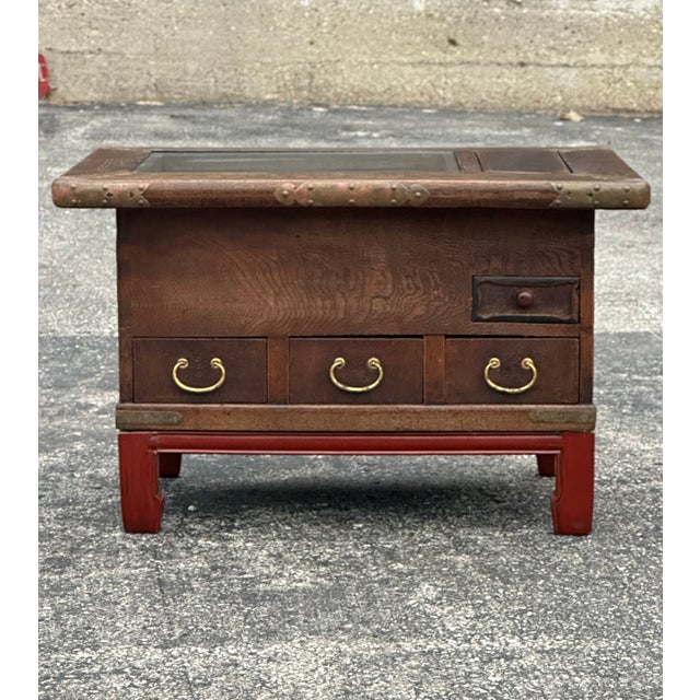 This hibachi table is made of elm wood and it has been used with charcoal to heat water for tea ceremonies but also to...