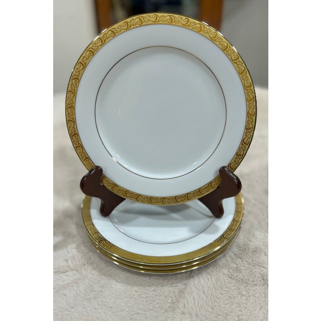 Beautiful salad/dessert plates with 24k gold rim.