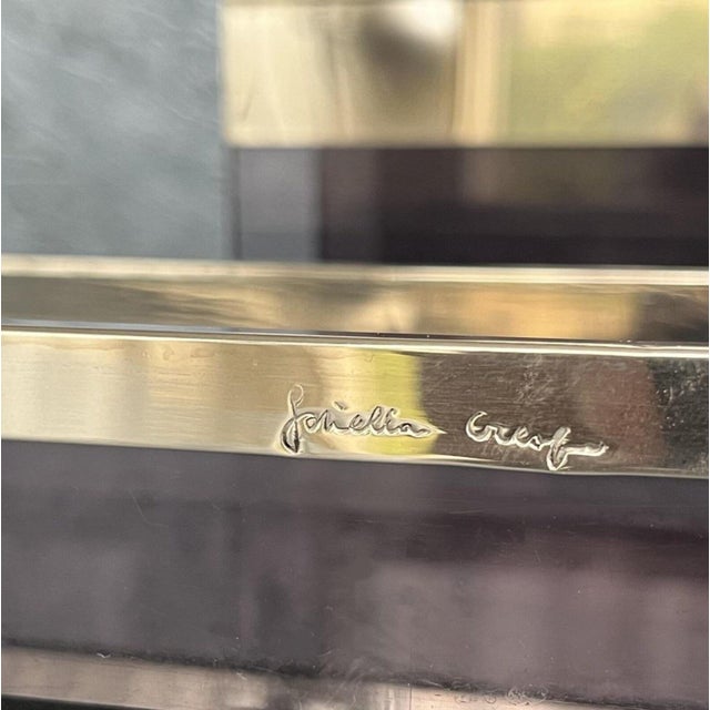 Desk kit from the 70s in plexiglass and steel. The two pieces bear the signature of Gabriella Crespi incised in the metal....