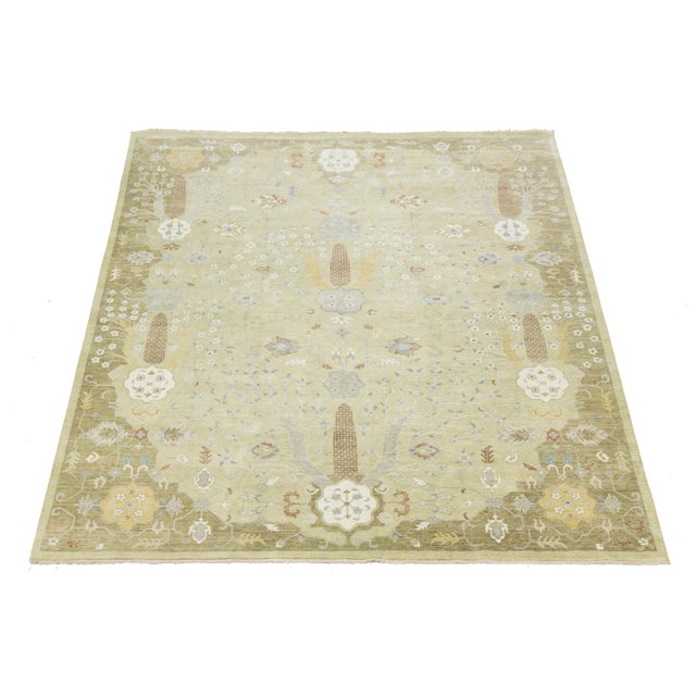 This contemporary Oushak-style wool rug seamlessly combines modern design with the timeless appeal of traditional Oushak...