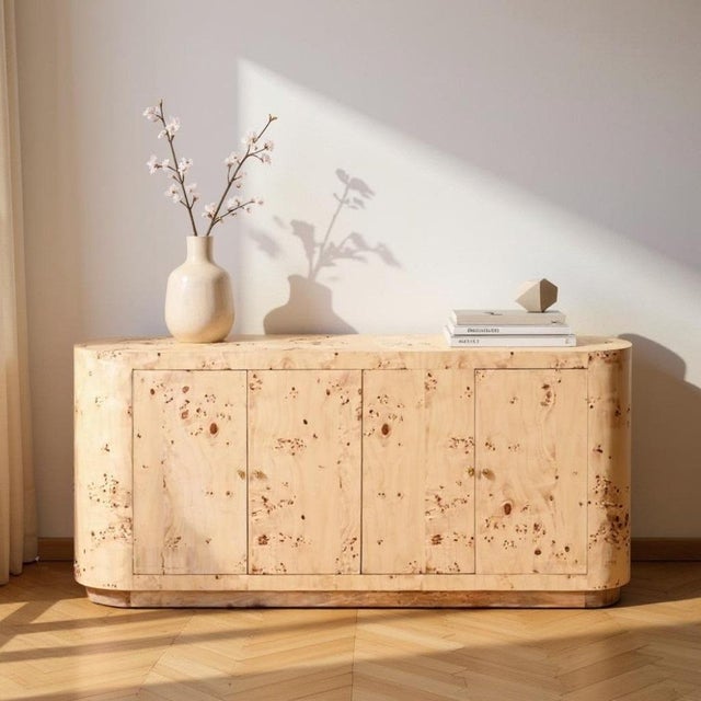 The Lowen 4 Door Sideboard offers a blend of style and functionality. Crafted from quality wood, its light brown finish...