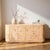The Lowen 4 Door Sideboard offers a blend of style and functionality. Crafted from quality wood, its light brown finish...