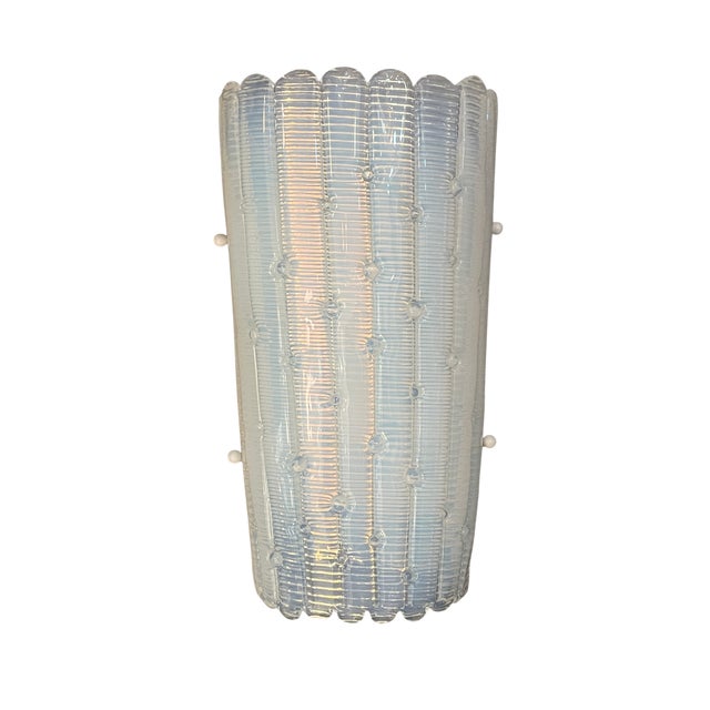 Pair of wall lights made of Murano Glass in opaline glass finish. Italian design, Mid Century made by the Murano masters....