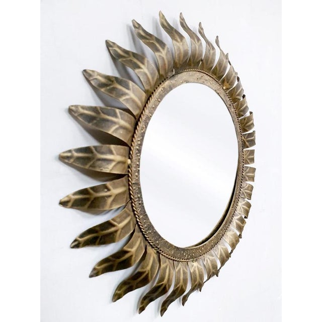 Mirror, mirror on the wall… Who is the fairest of mirrors? This beautiful sunburst mirror comes from France and dates back...