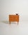 Teak bedside table with three drawers. Scandinavian production, 1950s/1960s. Made in Scandinavia between the 1950s and...