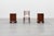 A sophisticated pair of Italian Art Deco nightstands from the 1920s, crafted in beautifully figured walnut and...