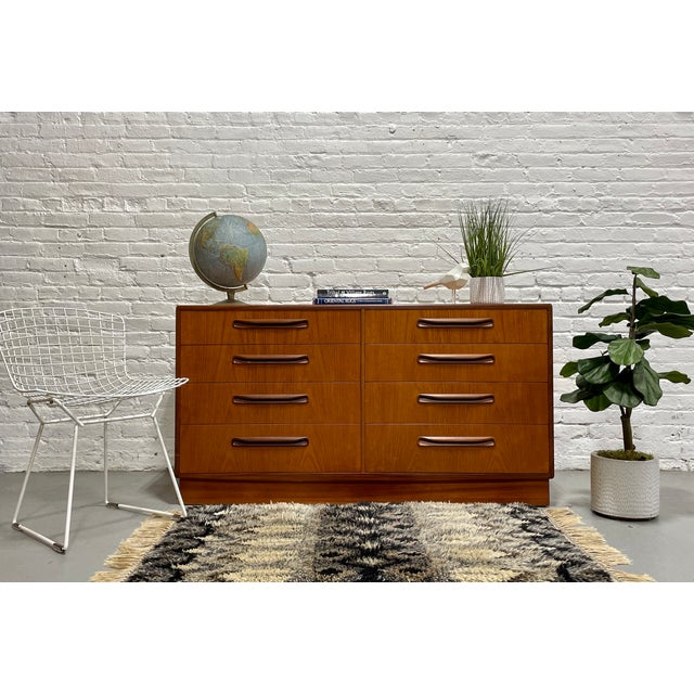 Vintage Mid century Modern Teak Double Dresser from G-Plan's iconic Fresco line, c. 1960's. This gorgeous piece packs a...