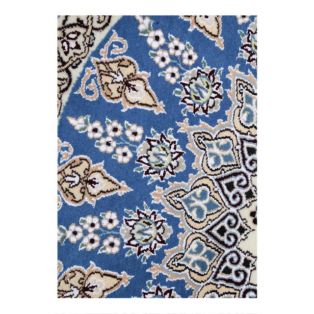 Nain rugs are renowned for their detail and fine use of outlining along the central motifs. Breaking from the classical...