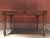 This charming dining table was totally handmade by the Italian Master craftsmen in 1850 circa. It depicts the traditional...