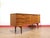 A stunning Mid eCentury Credenza, this vintage teak British sideboard perfectly embodies the timeless elegance sought by...
