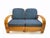Two-seater modular rattan sofa with blue fabric cushions and seat base coverings. The four loose cushions are 4 3/8"...