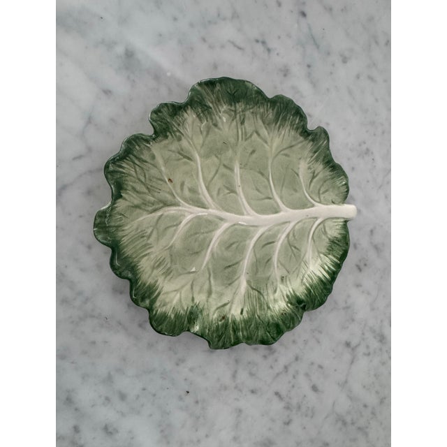 A vintage pair of porcelain cabbage leaf appetizer plates by Fitz & Floyd. Looks great with all other cabbage leaf pieces.