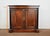 Small piece of furniture in mahogany Brandt with two doors, with mitered frames, darkened by panels with flat bands. It...