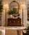 Elegant pair of vintage Neoclassical-style floor lamps featuring tall, slender columns wrapped in rich brown leather and...