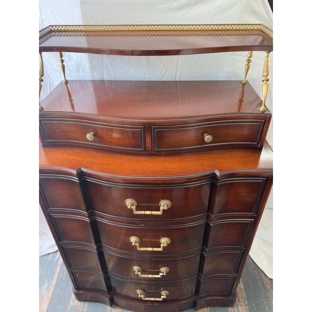 An exceptional, rare mid-century modern lacquered serpentine bow-front dresser by the renowned American manufacturer...