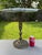 Offering for sale this exceptional vintage pedestal table featuring a white Italian marble top with gray veining and an...