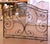 Decorate a hearth with this elegant antique wrought iron fire screen from France, crafted circa 1960. The tall single-...