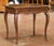 This elegant antique side table combines the warmth of richly patinated oak with the graceful lines of the Louis XV style....