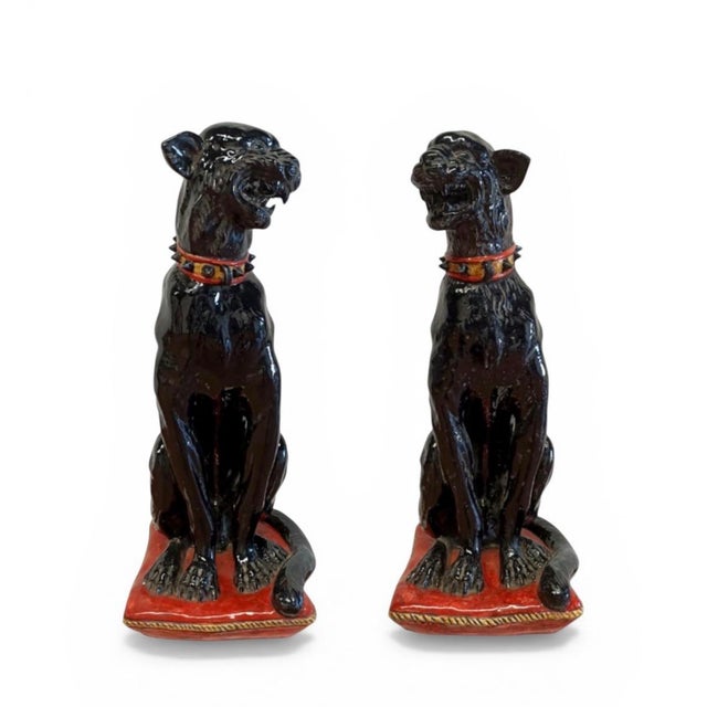 This striking pair of ceramic black panther statues captures the bold, sophisticated spirit of Mid-Century Italian design....