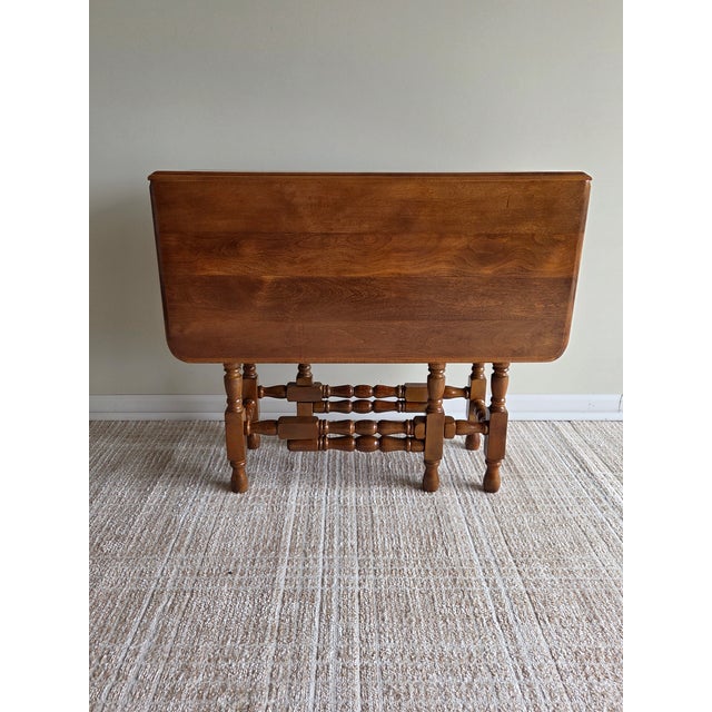 This gate leg table is beautifully crafted. When extended, its legs are joined into a unique and beautiful diagonal...