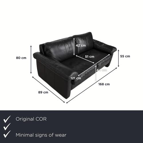 Bring home a true piece of design history with this black COR Conseta sofa. Designed by Friedrich-Wilhelm Möller in 1964,...